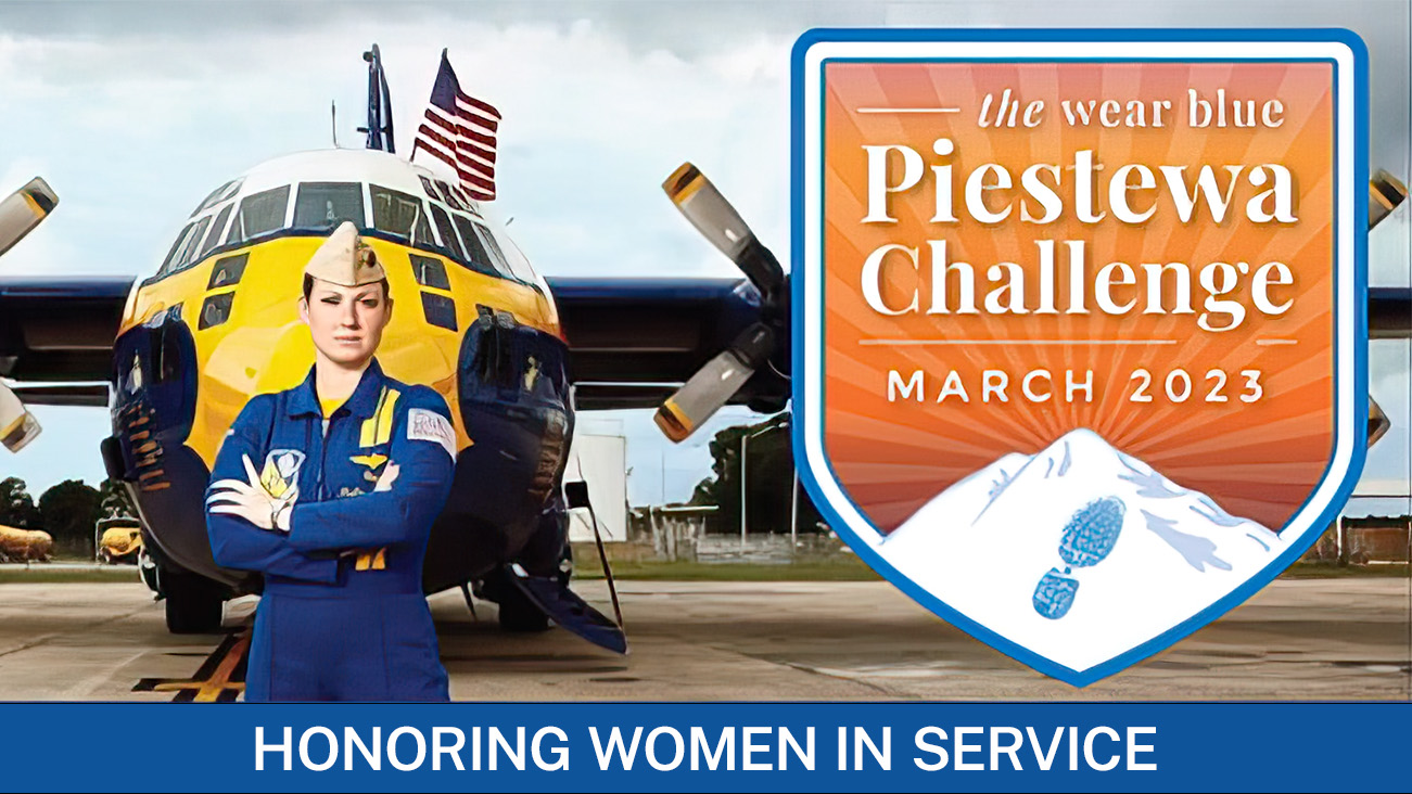 woman in uniform standing in front of military aircraft honoring women in service