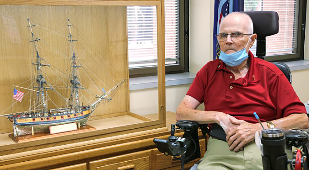 Spinal cord Veteran with model ship