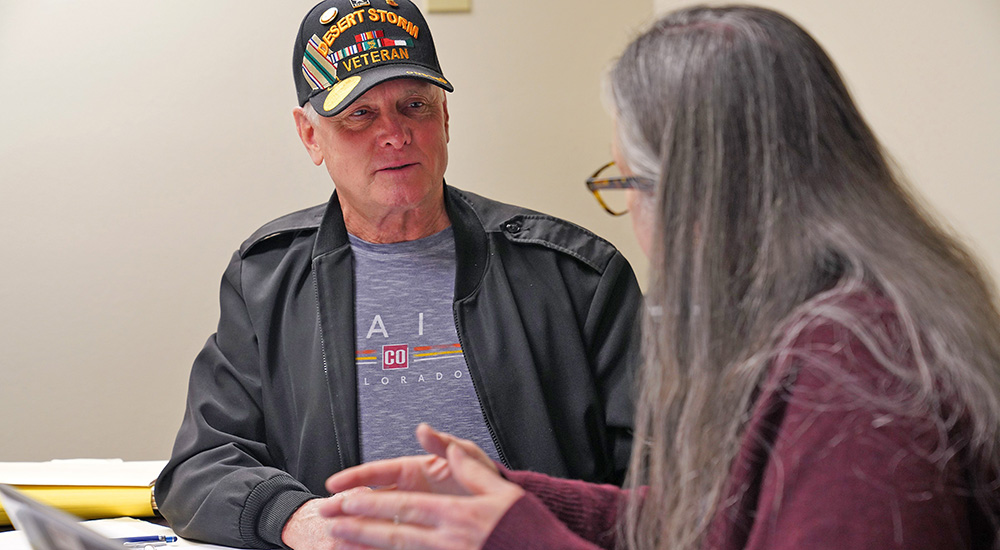 Nurse talking with Colorado Veteran about toxic exposures