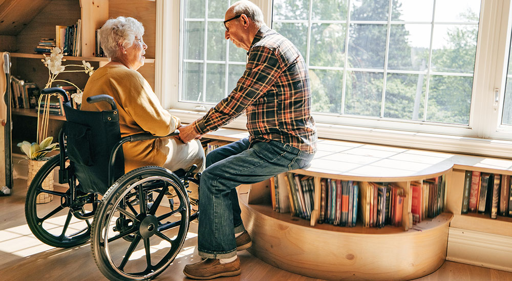 Caregiver talks with wife