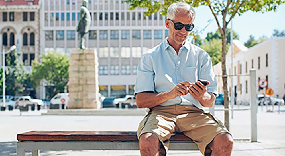 Eye care patient sitting on a bench