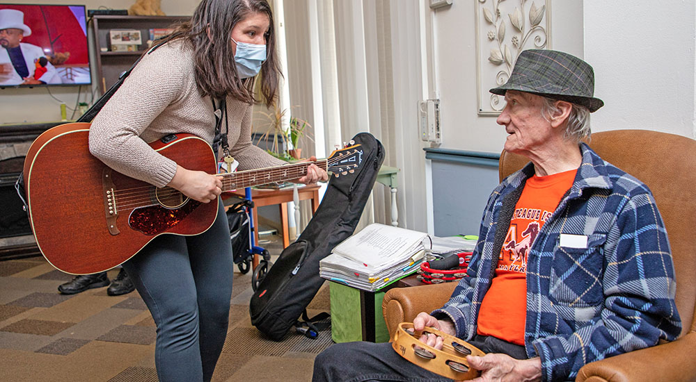 Music therapy specialist and senior Veteran