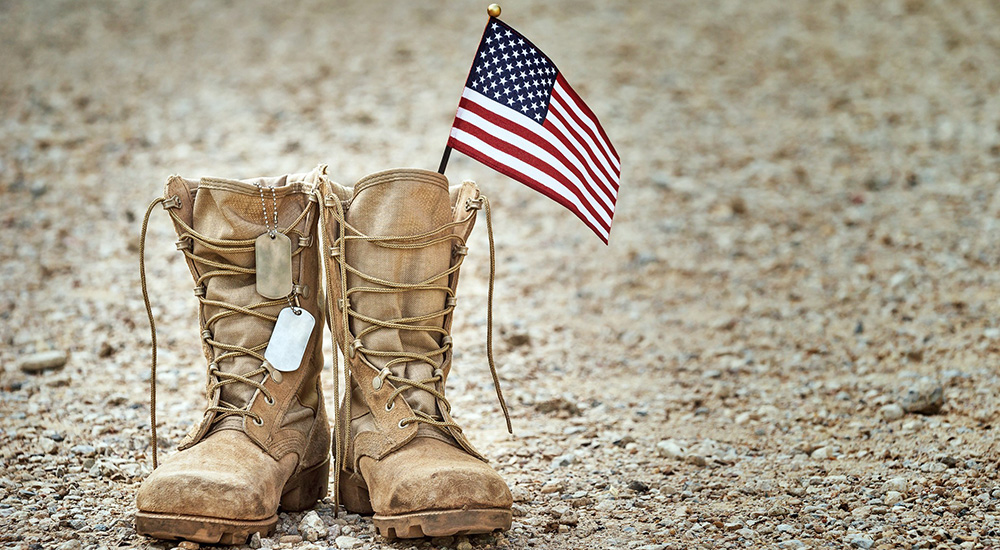Military boots with American flag; July 4