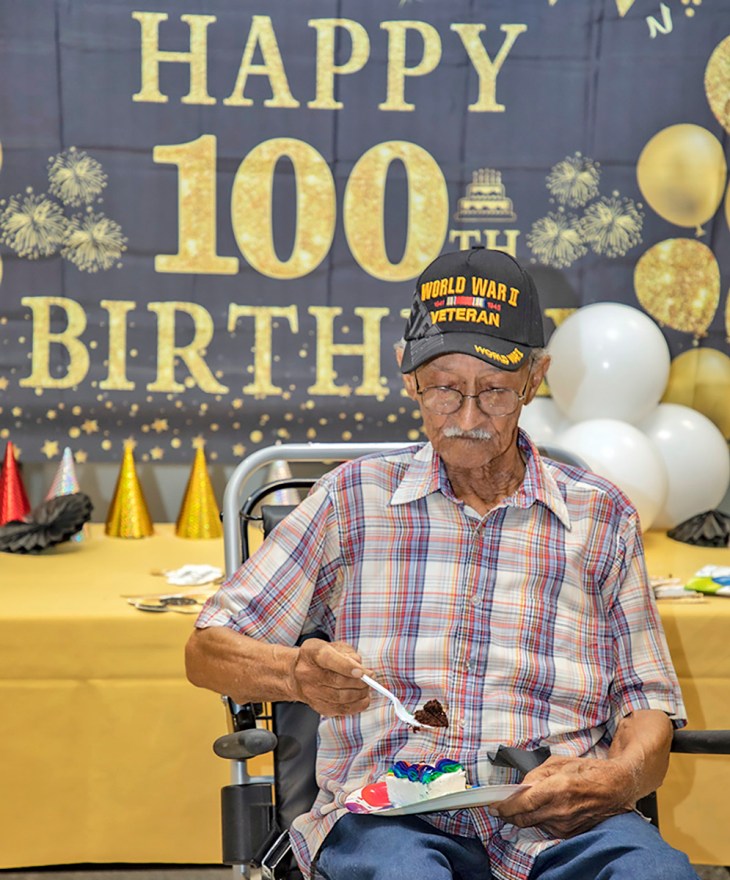 Veteran enjoys 100th birthday party cake