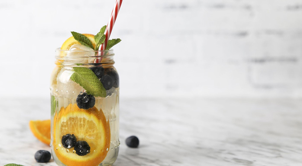 Mason jar with water and fruit