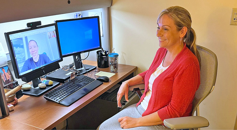 PTSD doctor conducts telehealth with Veteran