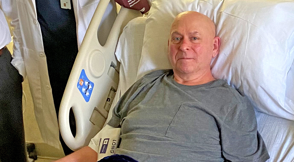 Veteran with ALS in hospital bed