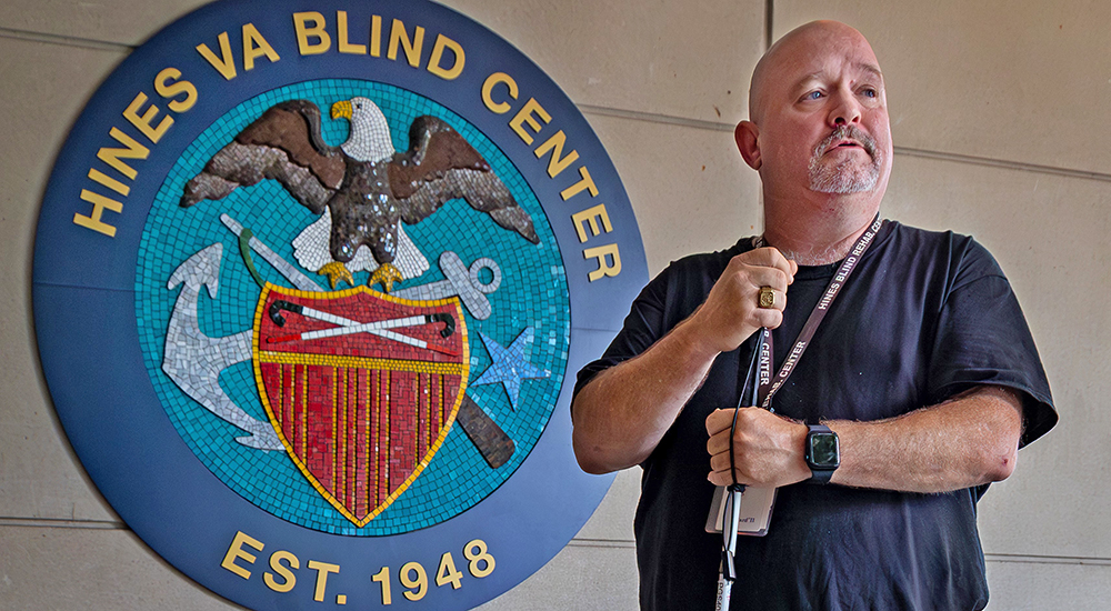 Blind Veteran holding white cane