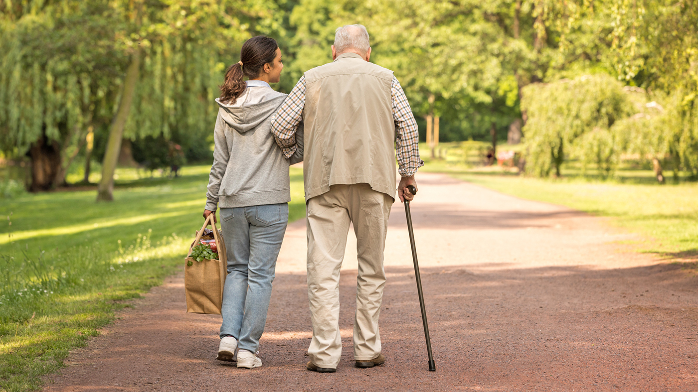 Caregiver assists Veteran on National Day of Service