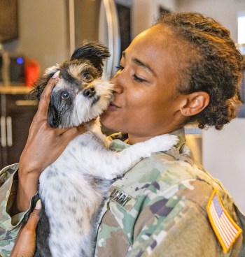 Veteran with dog in Pet Partners program