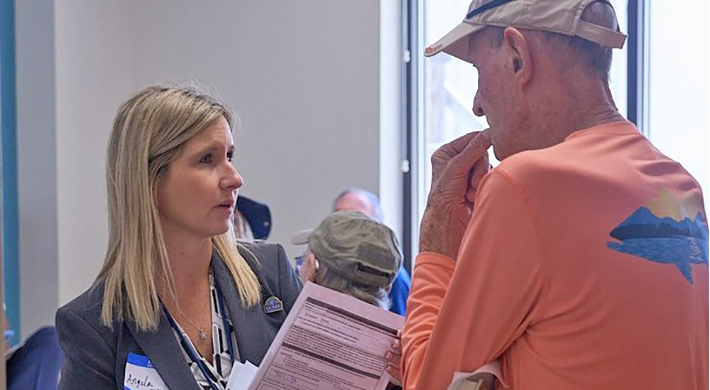 VA employee assists Veteran at VetFest