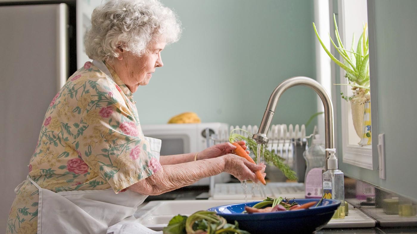 Woman prevents malnutrition with healthy vegetables