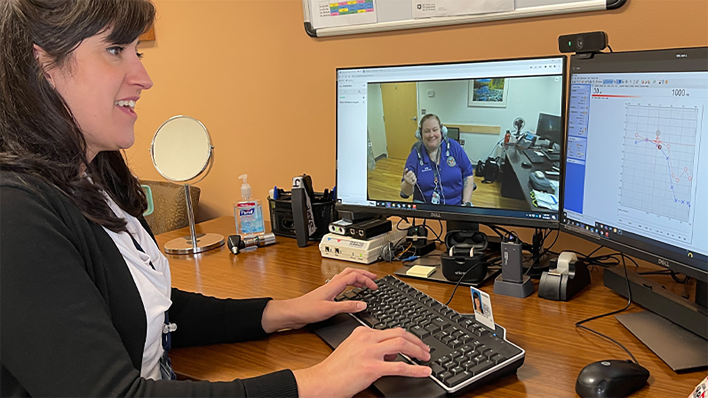 VA audiologist videoconferencing with telehealth clinical technician