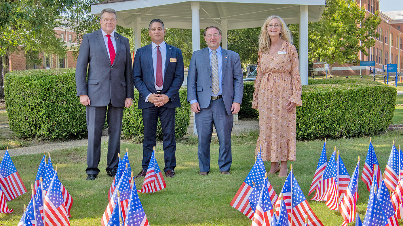 Executives at suicide memorial field of flags; Operation We Remember