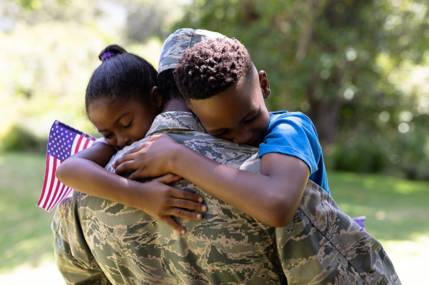 a military family embracing