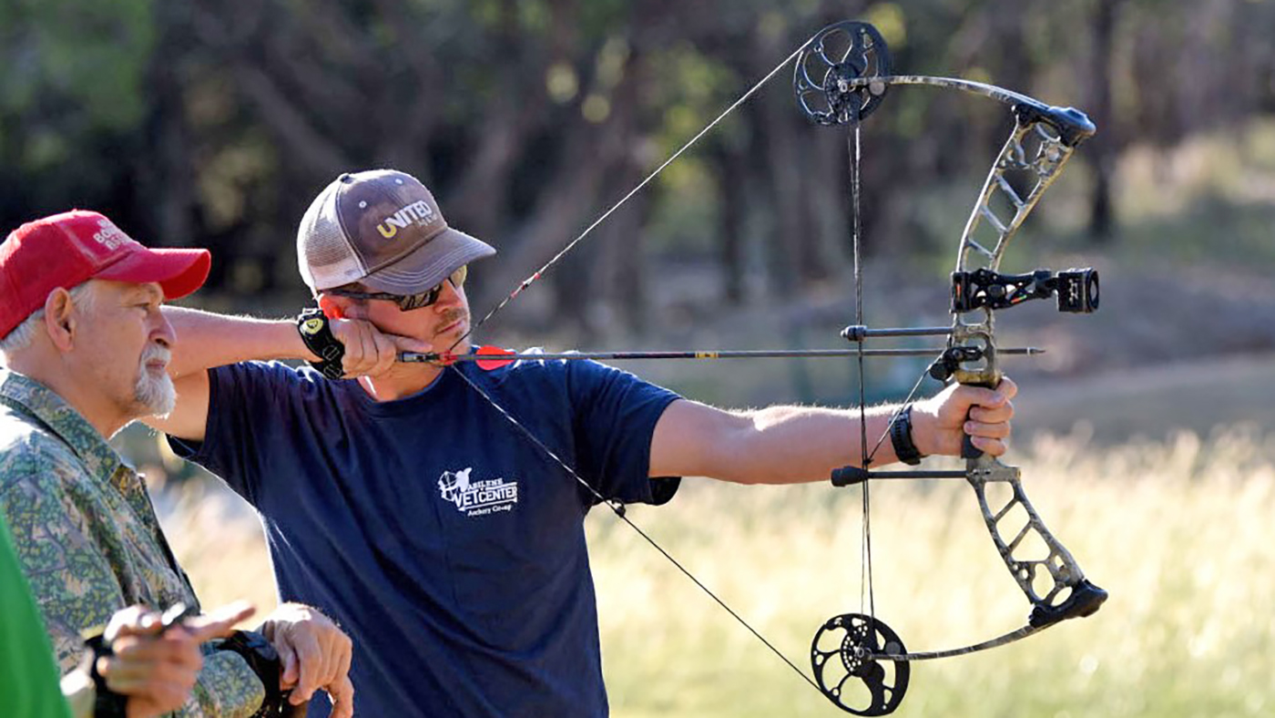 Vet in archery group pulls bow