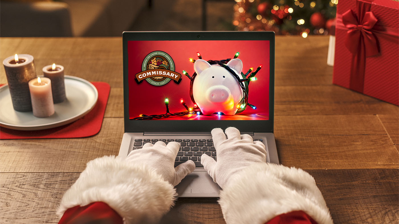 Santa on a laptop navigating to the Commissary web site.