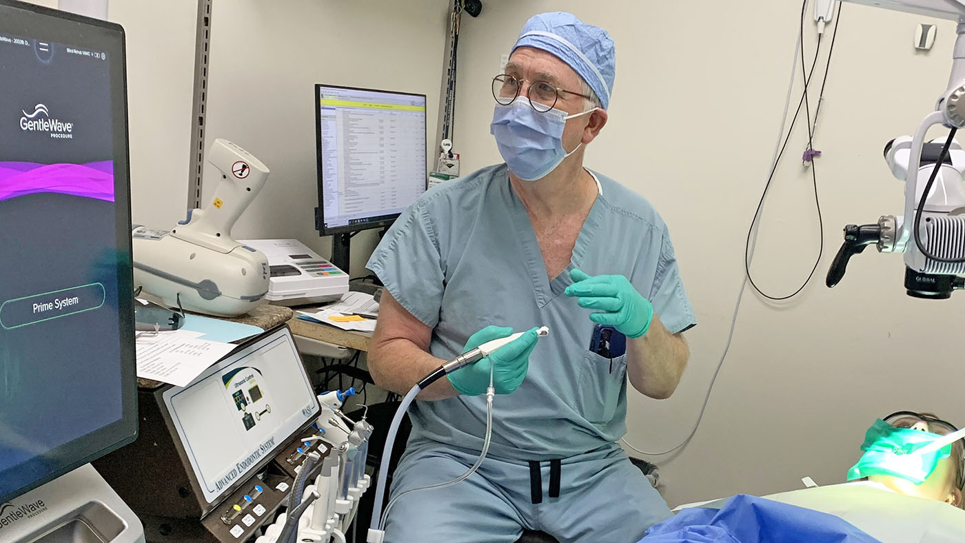 Dentist using GentleWave system dental procedure