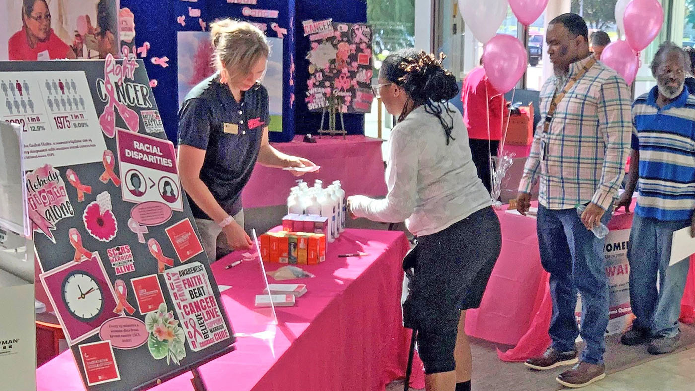 People at Pink Out event; breast cancer