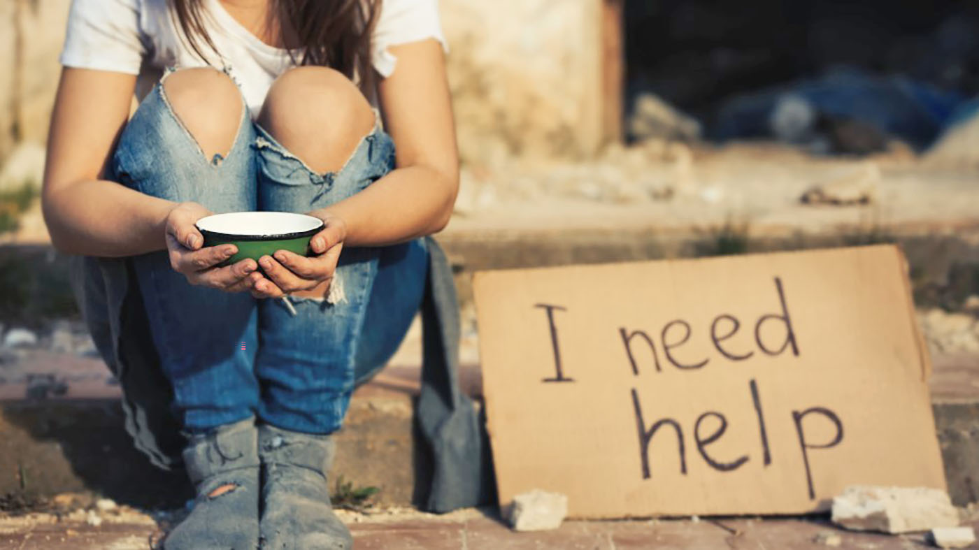 Woman begging for help on the street; homeless women