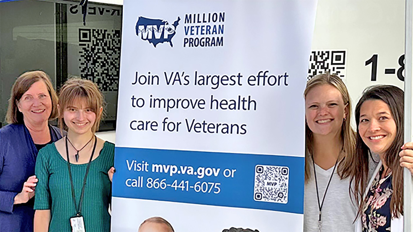 Women with Million Veteran Program poster; MVP