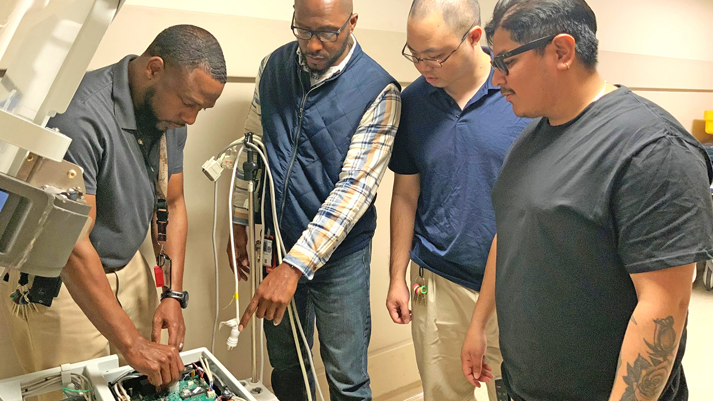 VA engineers inspect patient’s bed