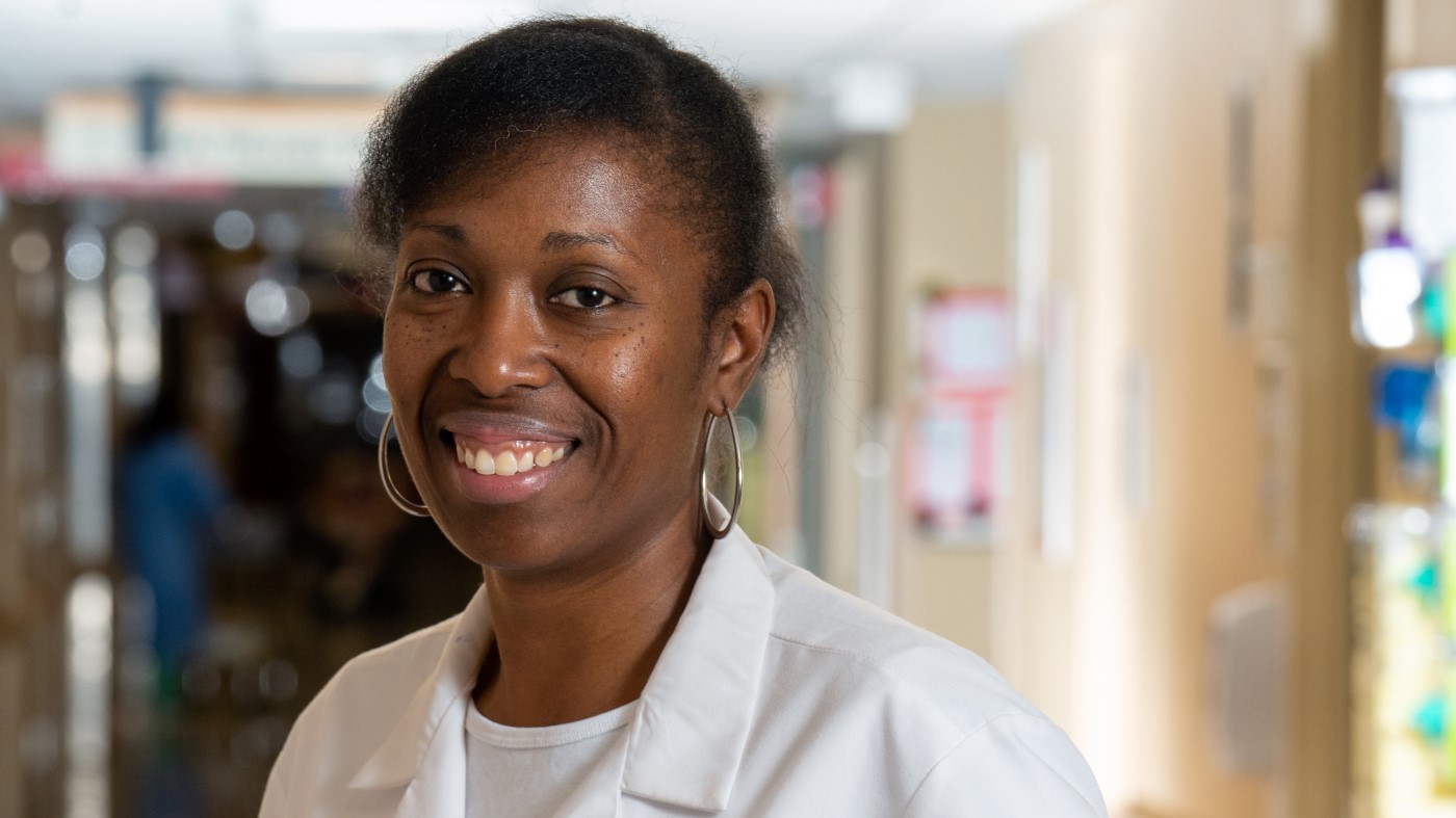 A physician assistant inside a VA facility.