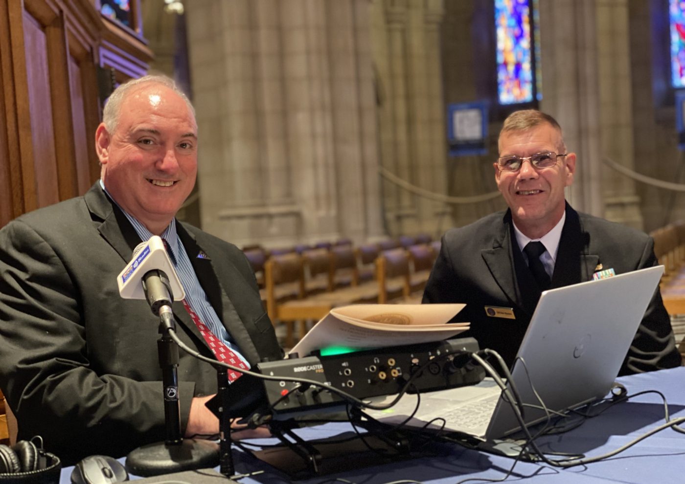 Wreaths Across America Radio’s Jeff Pierce (L) and Navy Cmdr. Brian Wierzbicki of DOD’s Vietnam War Commemoration project at the station’s broadcast of a “Celebration of Character and Courage” at the Washington National Cathedral on Jan. 13, 2024.