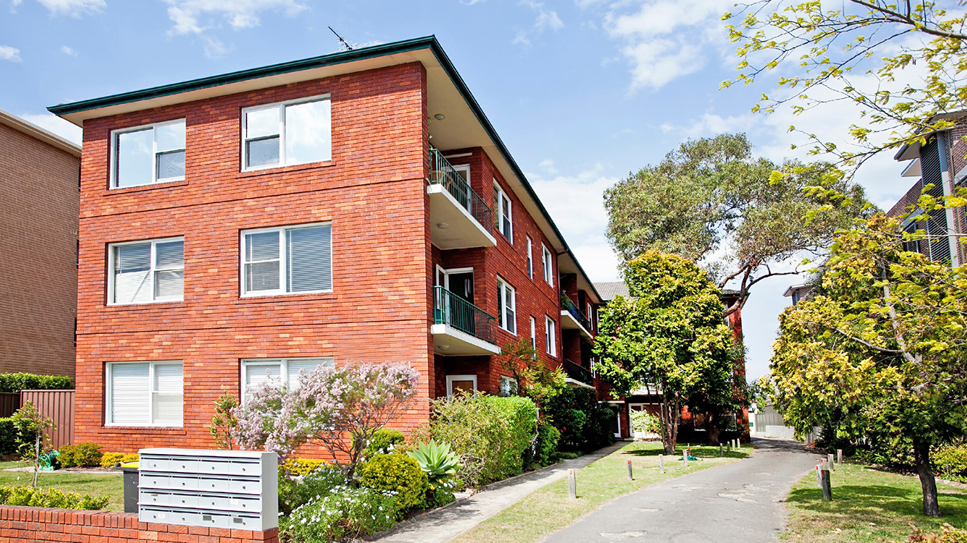 Brick apartment building; homeless