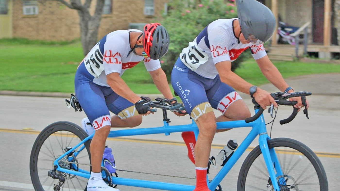 Two on tandem bike