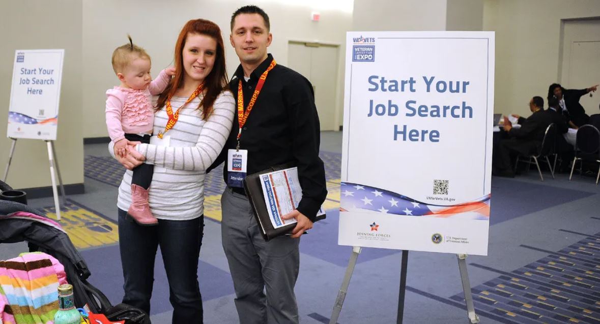 Couple at jobs hiring event for Veterans.