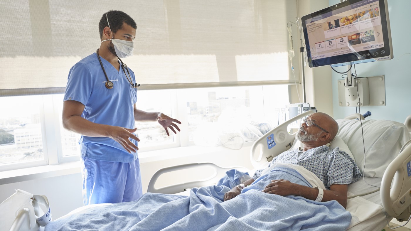 A VA physician discusses gastroenterology concerns with a patient.