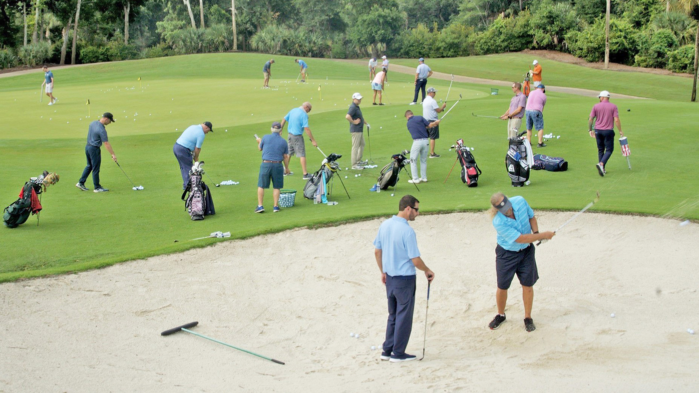 Veterans playing golf