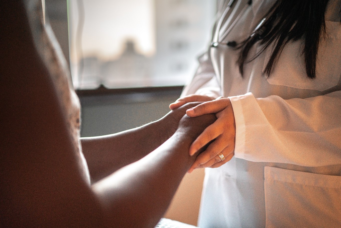 Veteran Cancer Survivor holding hands header