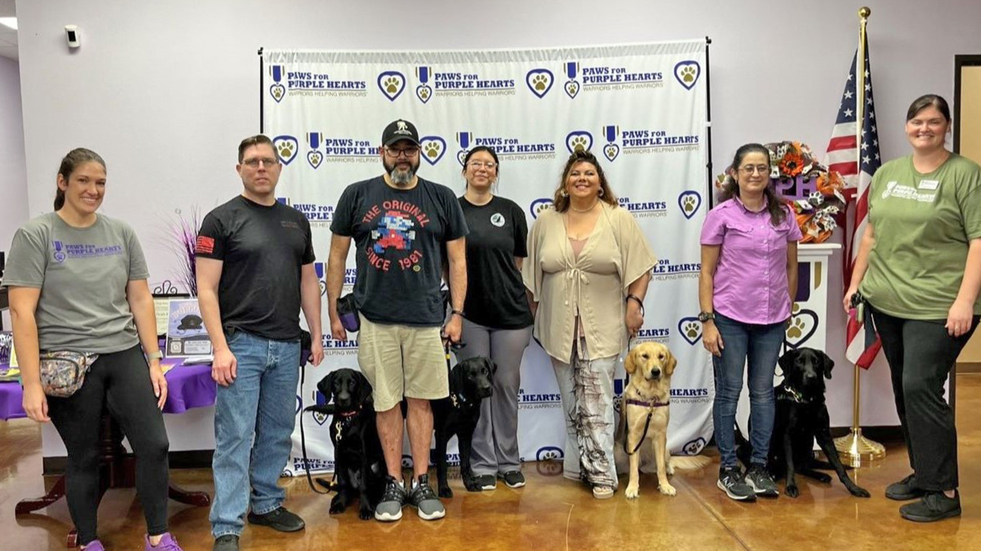 Group with dogs; PAWS