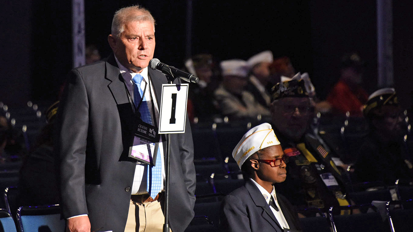 Employee delivers testimonial; American Legion convention