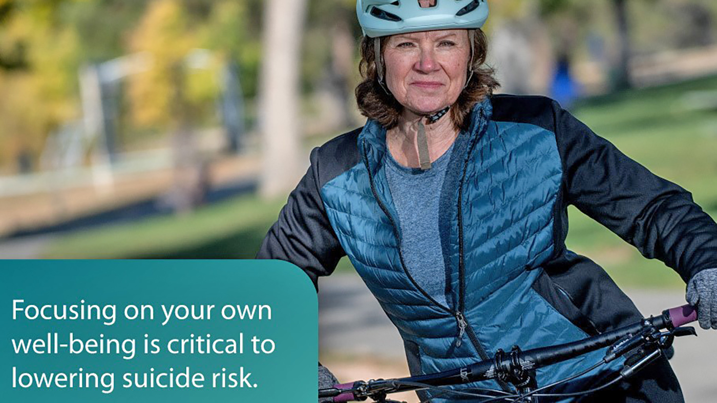 Woman wearing blue vest; well-being