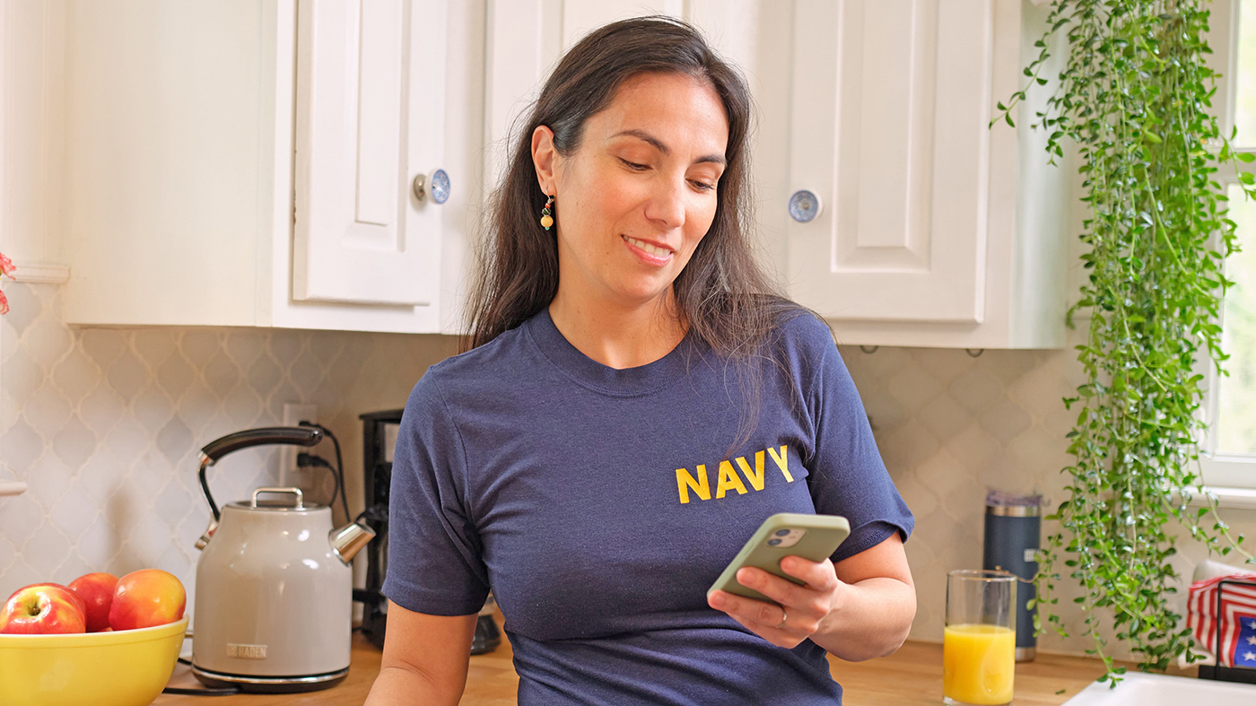 Woman checking text messages on phone