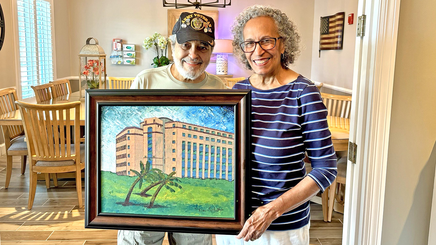 Veteran, his wife and his painting