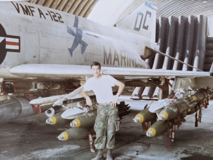 Marine Corps veteran Tony Pulliam stands in front of an F-4 Phantom in Vietnam.