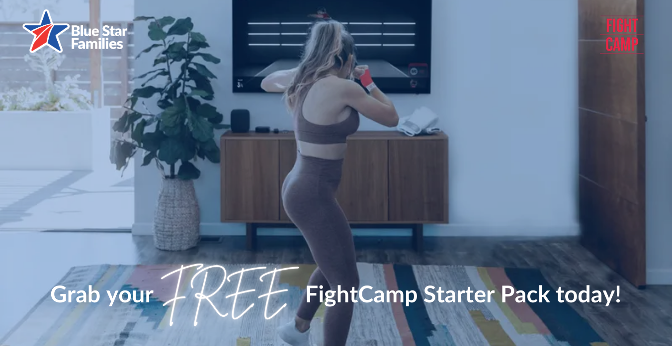 Woman boxing in front of television. Free Fight Camp app from Blue Star Families.